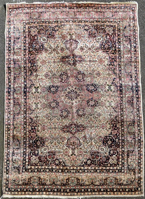 A Tabriz rug, 9ft by 6ft 1in.